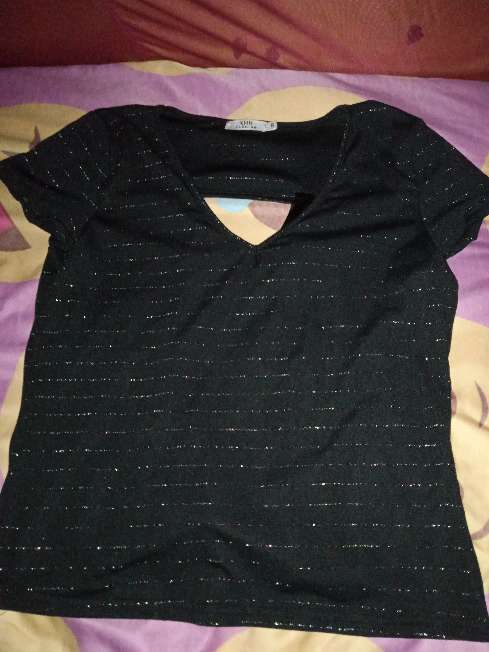 REGALO Blusa liviana con escote de espalda. REGALO Blusa liviana con escote de espalda.