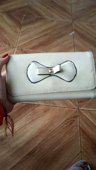 REGALO Cartera color beige usada 1