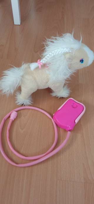 REGALO caballito de juguete con movimiento  1